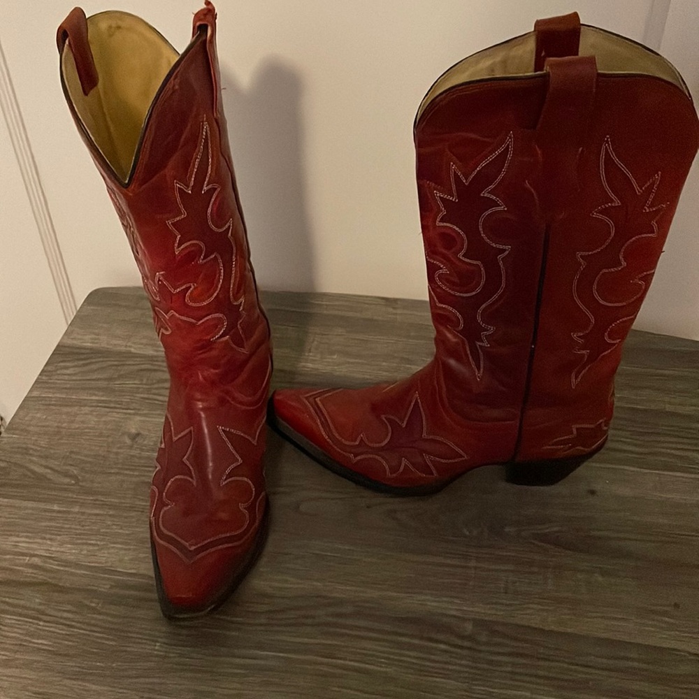 Red leather cowboy boots.